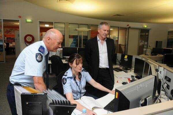 Victoria Police assistant commissioner Stephan Fontana, Sergeant Vicky McDonald and ESTA general manager operations Graham Thiessen at the new communications centre at Mt Helen. Picture: Lachlan Bence