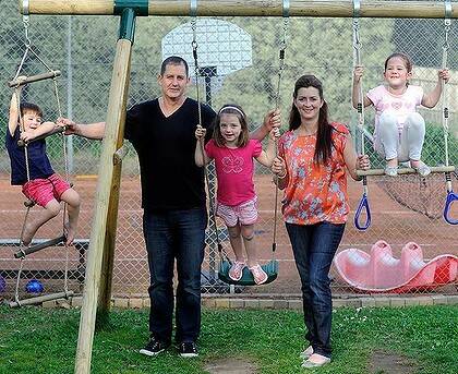 Doing it tough ... New Fremantle coach Ross Lyon, with wife Kirsten and their children.