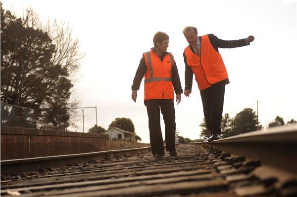 ON TRACK: Transport Minister Lynne Kosky and Ballarat East MLA Geoff Howard at Creswick on Friday