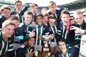 The St Patrick’s College team celebrates with the trophy after claiming back-to-back MCC-Herald Sun Shield titles for the first time in the school’s history.