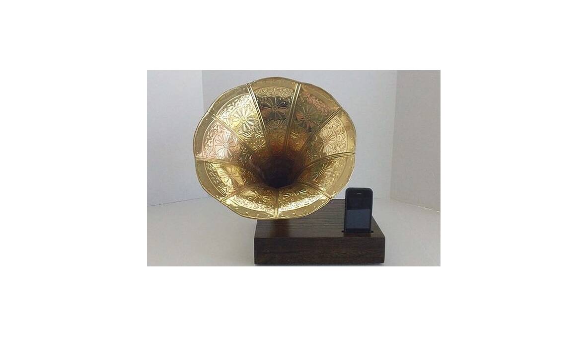 For the classic music lovers ... This speaker from ReAcoustic for your iPhone utilises a vintage style metal reproduction phonograph horn, US$287. Available at: http://www.etsy.com/listing/119431262/acoustic-iphone-speaker-dock-w-ornate