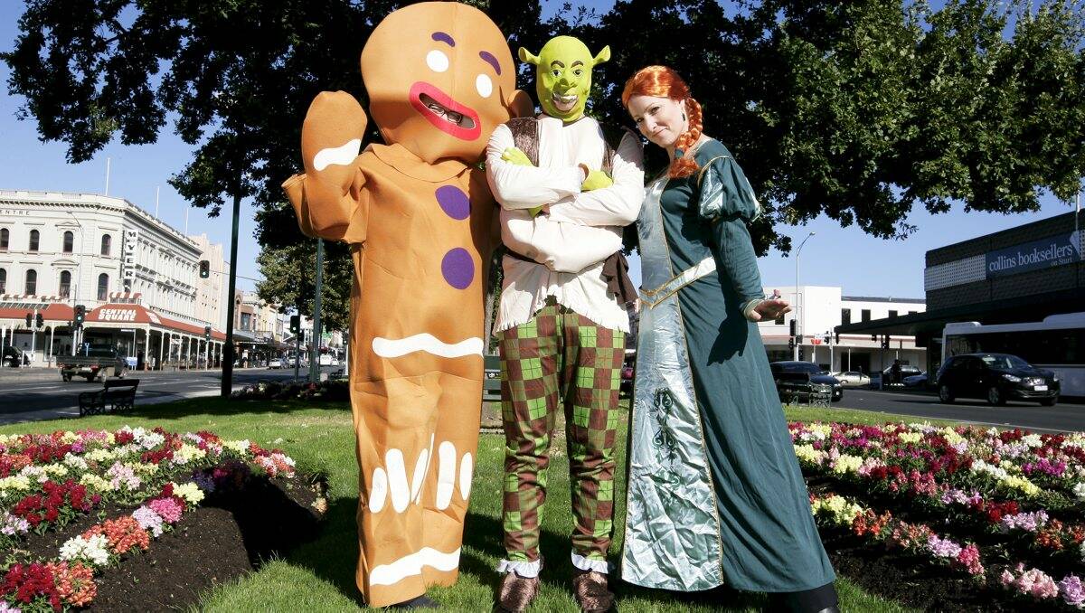 Festival fun: Jenny Dare (Gingerbread Man), Cullen Hodge (Shrek) and Katherine Armati (Princess Fiona) are all set to take part in the Begonia Festival parade. PICTURE: CRAIG HOLLOWAY