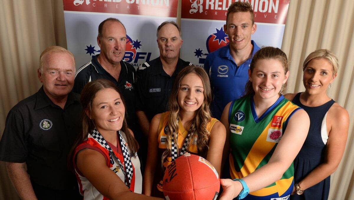 In the spirit:  From back left, Victoria Polie Blue Ribbon Foundation CEO Neil Soullier, Ballarat Football Netball League chairman Michael Toner, Leading Senior Constable Jeff Whittaker, North Melbourne footballer Drew Petrie and Netball Spirit Ambassador Georgia Cann; front, netballers Taylor Bowen, Amy McDonald and Nikkita Alexander. PICTURE: KATE HEALY