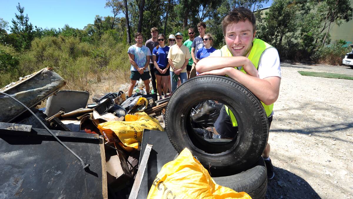 Tom Kelly and a group of volunteers at the Clean Up Australia Day site today. PHOTO: Justin Whitelock.