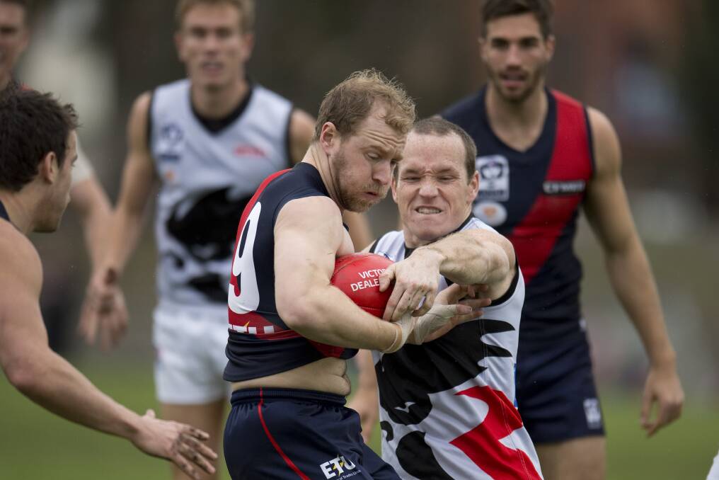 Steve Clifton tackles Coburg's Ben Clifton in round 16 this year.