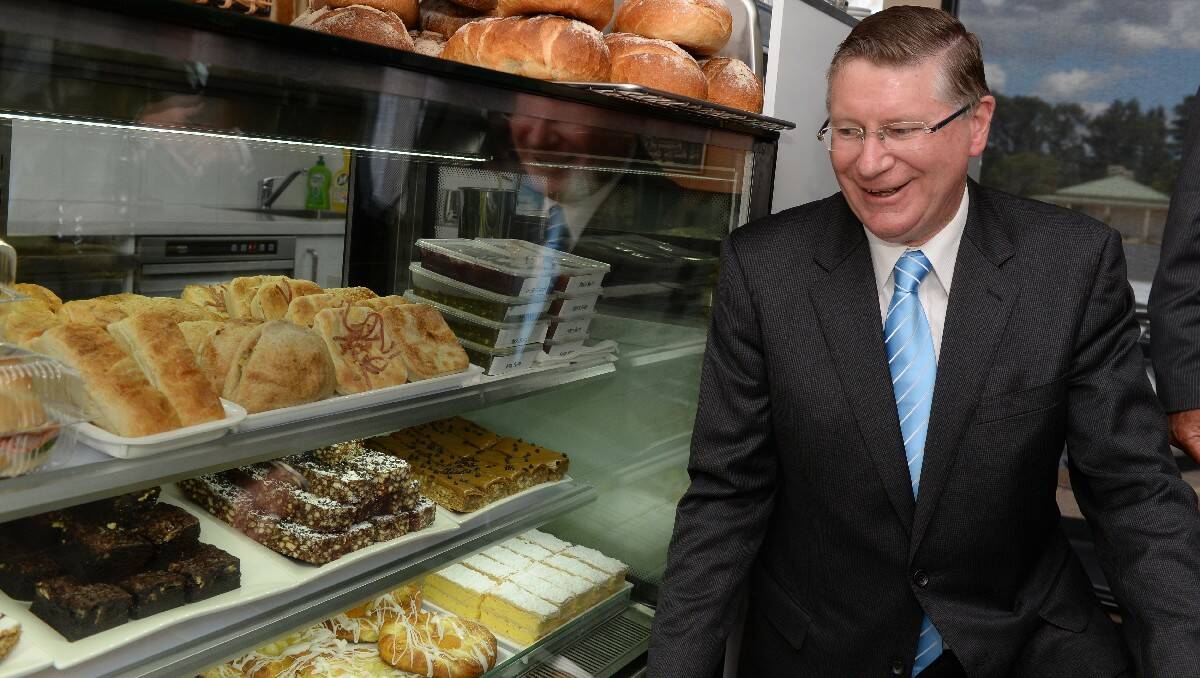 Premier Denis Napthine opening the Ballarat Specialist School farm campus's new bakery cafe. PIC: KATE HEALY