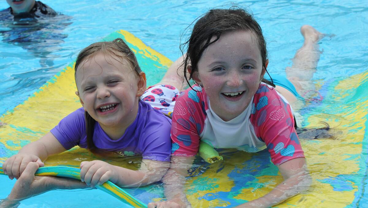 4 year old Abby Morton, 8 year old Bella Vagg at Buninyong Pool. PIC: LACHLAN BENCE