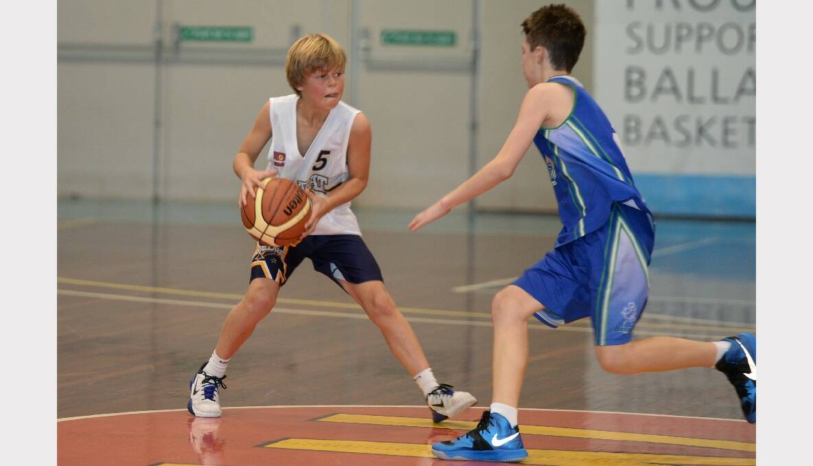 Junior Basketball Tournament: Under 14A boys - Ballarat Blue v Broadmeadows. Riley Polkinghorne (Ballarat Blue) and Kyle Gillard (Broadmeadows). PICTURES: KATE HEALY 