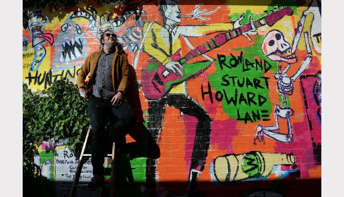 Local artist Casey Tosh has created his own mural dedicated to music legend Rowland S Howard in a laneway off Webster St.