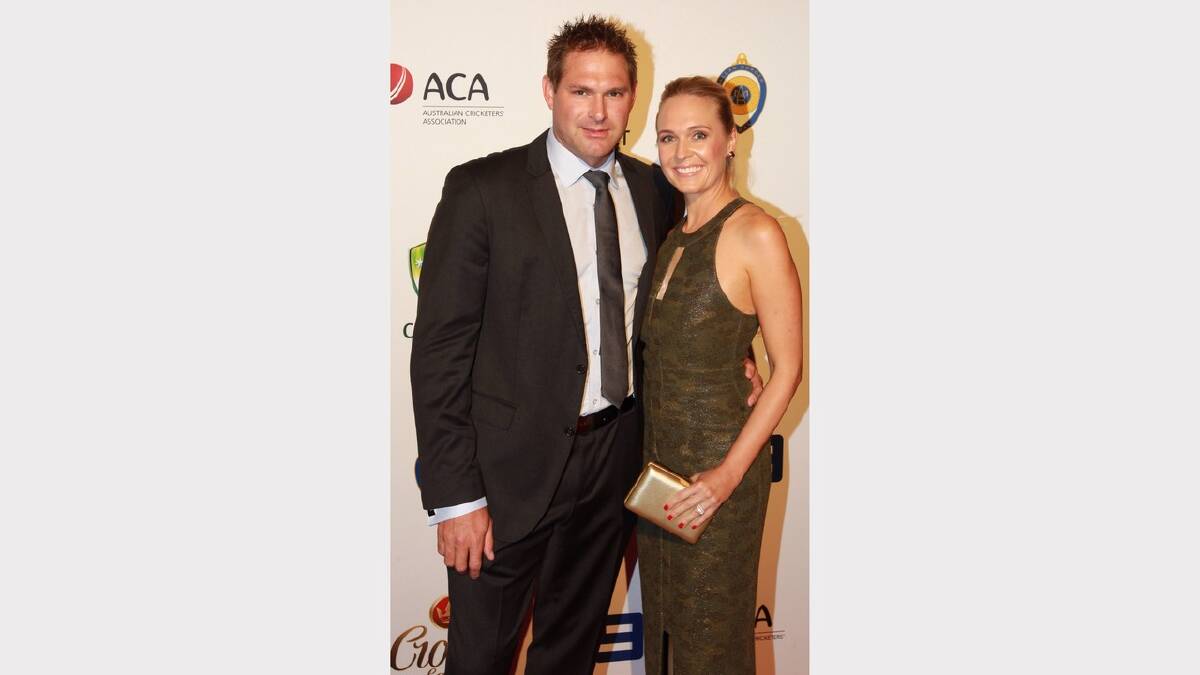 Ryan Harris and Cherie Harris  arrive at the 2014 Allan Border Medal on Monday night. Picture: Ben Rushton 