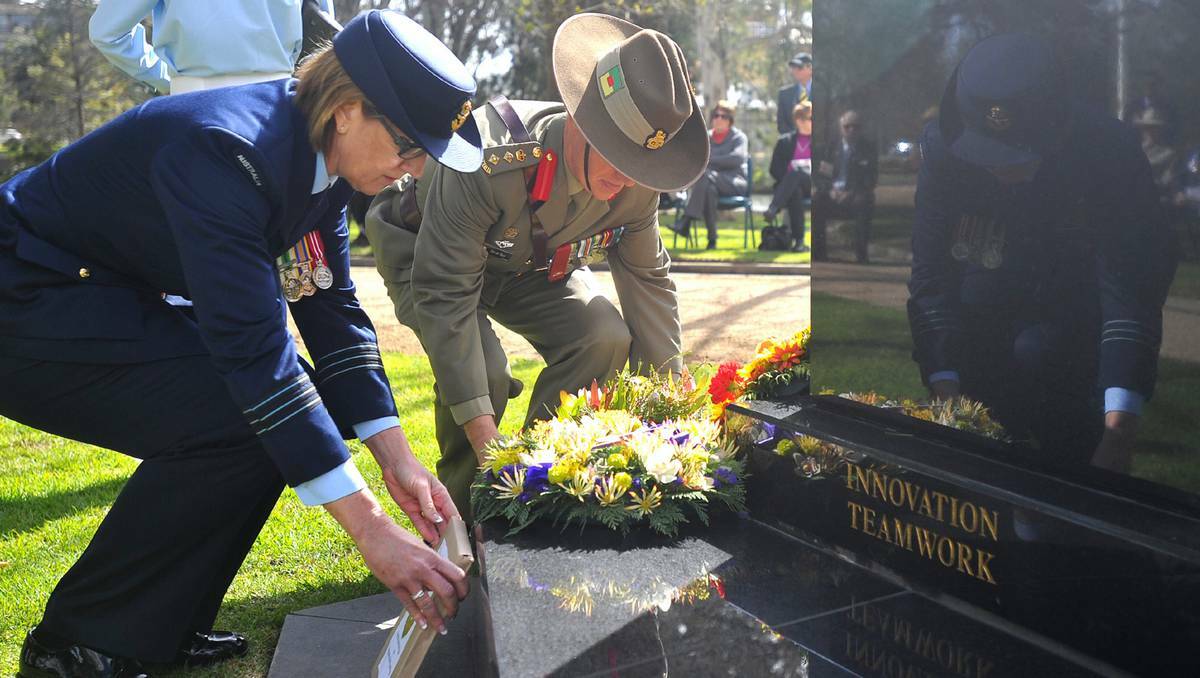 Vietnam Veterans Day ceremony at the Victory Memorial Gardens in Wagga, NSW. Wing Commander Wendy Gill and Colonel David Hay laying their wreaths. Picture: Addison Hamilton
