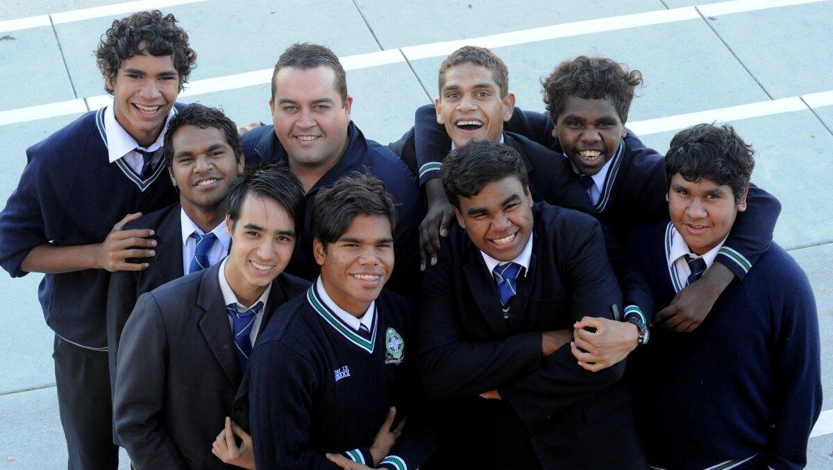 OPPORTUNITIES: Part of the proud contingent of Aboriginal students at St Patrick's College with indigenous education manager Rick Balchin. Photo: Jeremy Bannister.