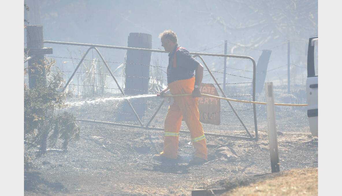 Fire crews work to extinguish the blaze at Blampied. PICTURE: LACHLAN BENCE.