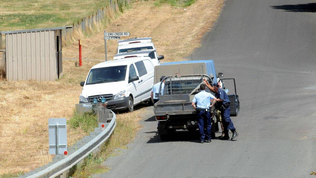 Police search vehicles at the entrance to Langi Kal Kal Prison at Trawalla in December. FILE PHOTO.