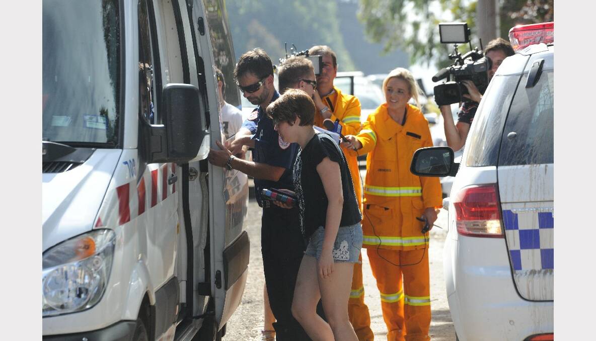 School children staying at Rutherford Park were being examined by paramedics for smoke inhalation. PICTURE: LACHLAN BENCE.