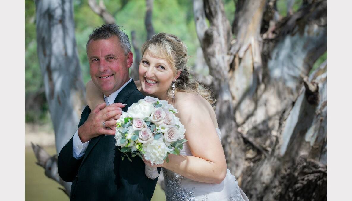  Kerri-Ann Batchelor and Rodney Mayne, married on November 24, 2012 at Bright on the Murray, Moama. Attendants: their four children. The pair honeymooned on the Fijian islands. Picture: Picturebook Photographics.