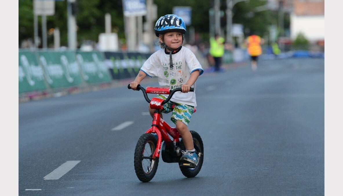 Elliot Hotchin, 3, enjoying a ride at the end of the race. PICTURE: ADAM TRAFFORD. 