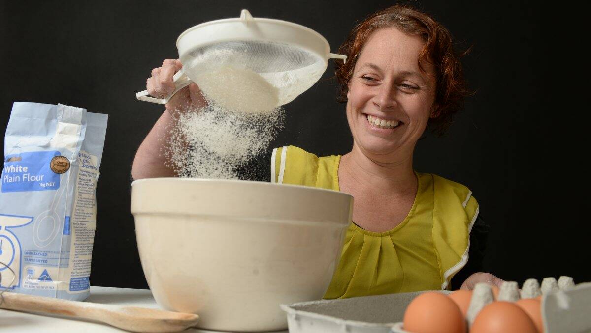 Michelle Symes, baker and founder of Baking Our Blues Away, whips up a treat. PHOTO: KATE HEALY.
