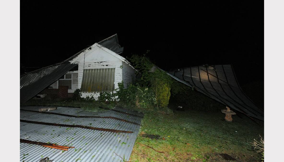 RIPPED OFF: A house in Geelong Road, Mount Helen which lost its roof in the storm.