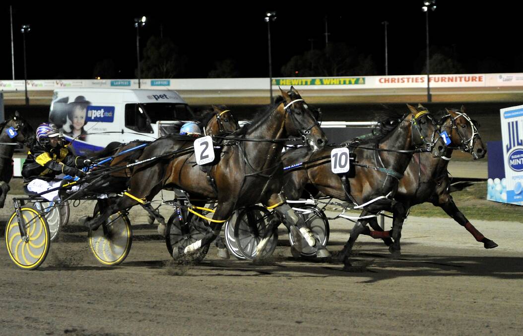 Restrepo (Gavin Lang) centre, edges out Christen Me (Dexter Dunn) right, and Caribbean Blaster (Kate Gath) in the Ballarat Pacing Cup on Saturday, January 25 