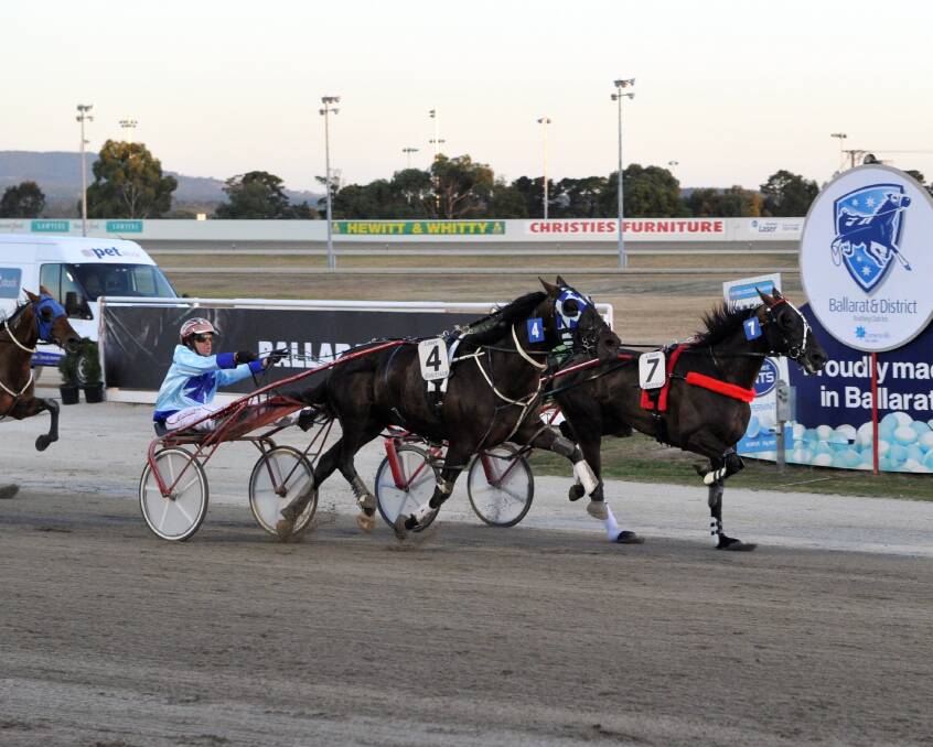 I See Icy Earl (Greg Sugars), left, grabs odds-on favourite Blitzthemcalder (Chris Alford) in an Australasian Trotting Championship heat. 