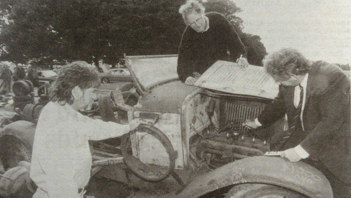 Year 1994 - Organiser Trevor Wolstenholme and the Minister for Sport, Recreation and Racing  Tom Reynolds inspect a 1928 Pontiac owned be Neville Podger of Timboon. 