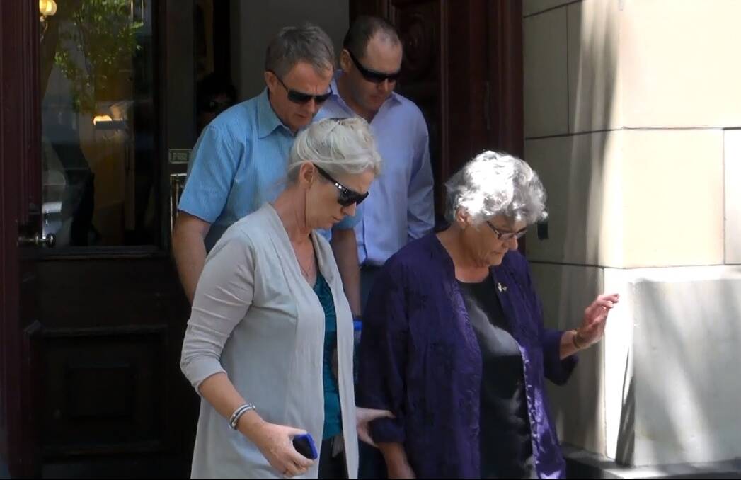 Helen Streeter (right) and Anthony Streeter (top) leave court today with other family members.