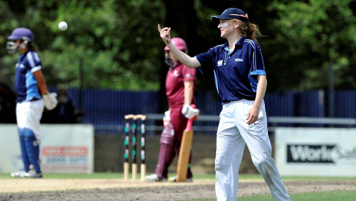 Auckland's captain Francesca Wikinson flick the ball back to the bowler