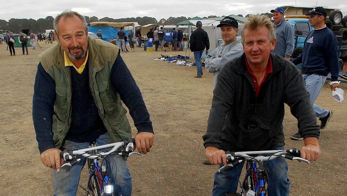 Year 2004. Peter Whittle and Peter Niblett find bicycles the best way to get around