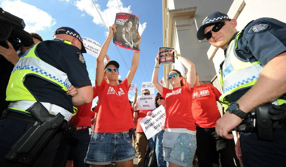 Paramedics protest outside Simon Ramsay's new office. Picture: Justin Whitelock