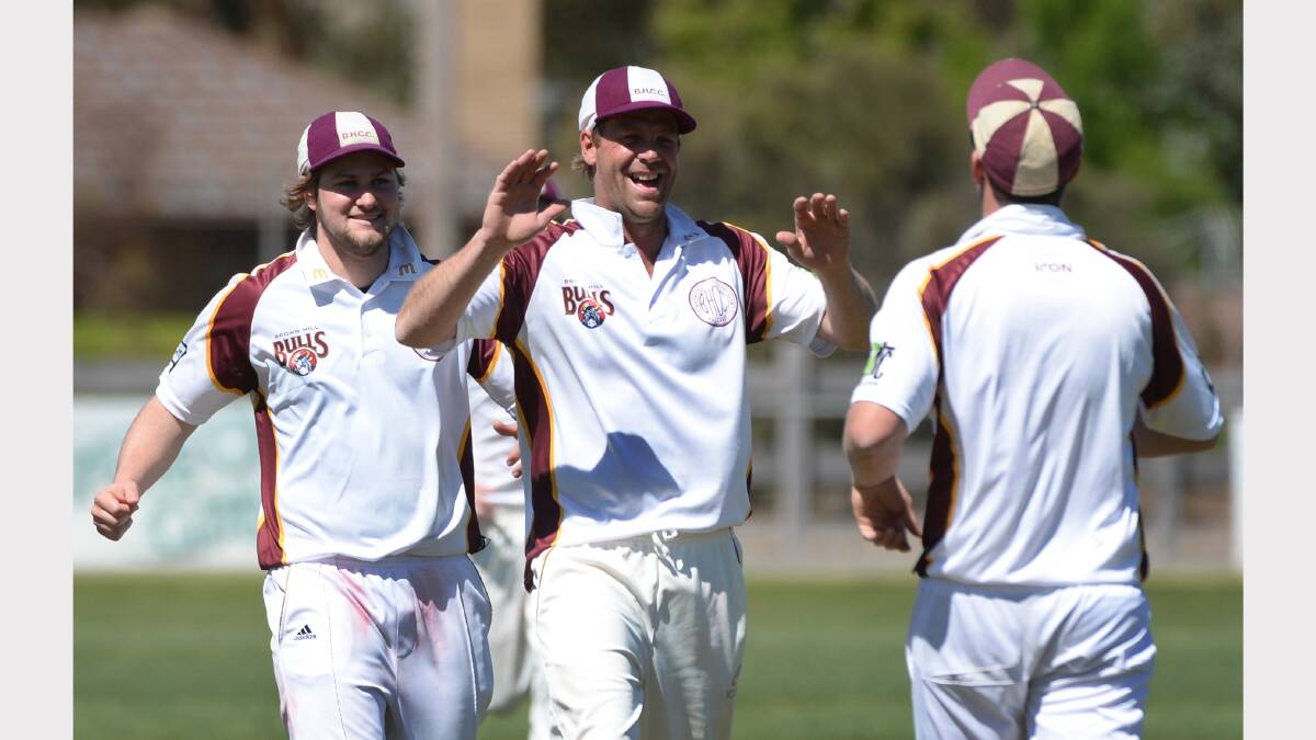 Shane Harwood congratulates Nathan Edwards on a catch Cricket 1sts Darley V Brown Hill @ Darley PHOTO: ADAM TRAFFORD