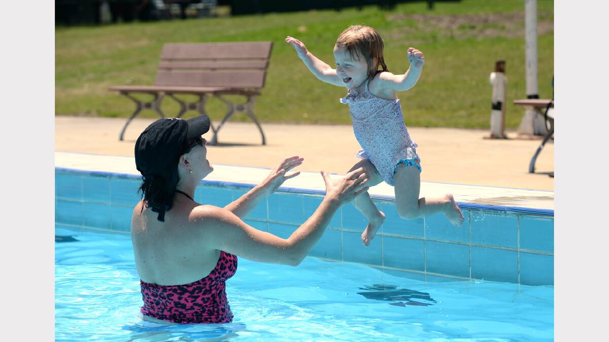 Evie Martin -1yo jumps into the arms of her mum Kate Martin at the Eureka Pool. PIC: ADAM TRAFFORD