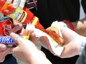 Having your say always goes better with a sausage on election day. PICTURE: THE COURIER