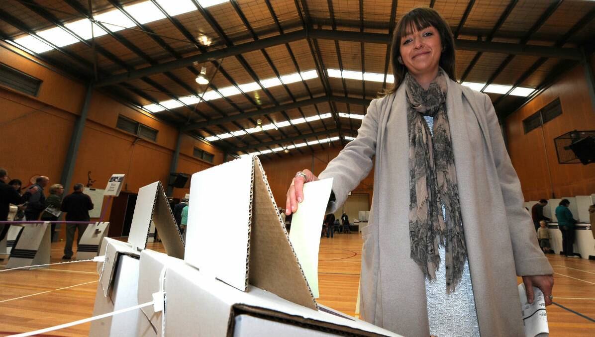 Ballarat Greens candidate Stephanie Hodgins-May casting her vote at Buninyong today. PICTURE: JUSTIN WHITELOCK