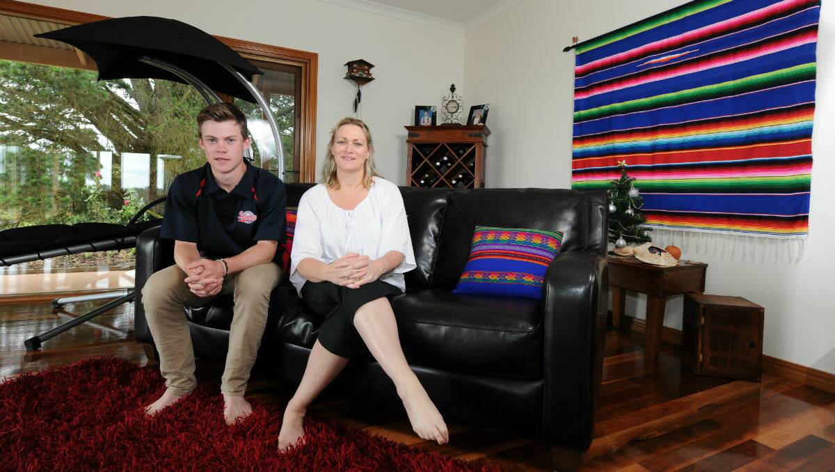 Jo-anne Dyer with her son Ethan Ethridge in their Wilson Street home. PICTURES: JUSTIN WHITELOCK