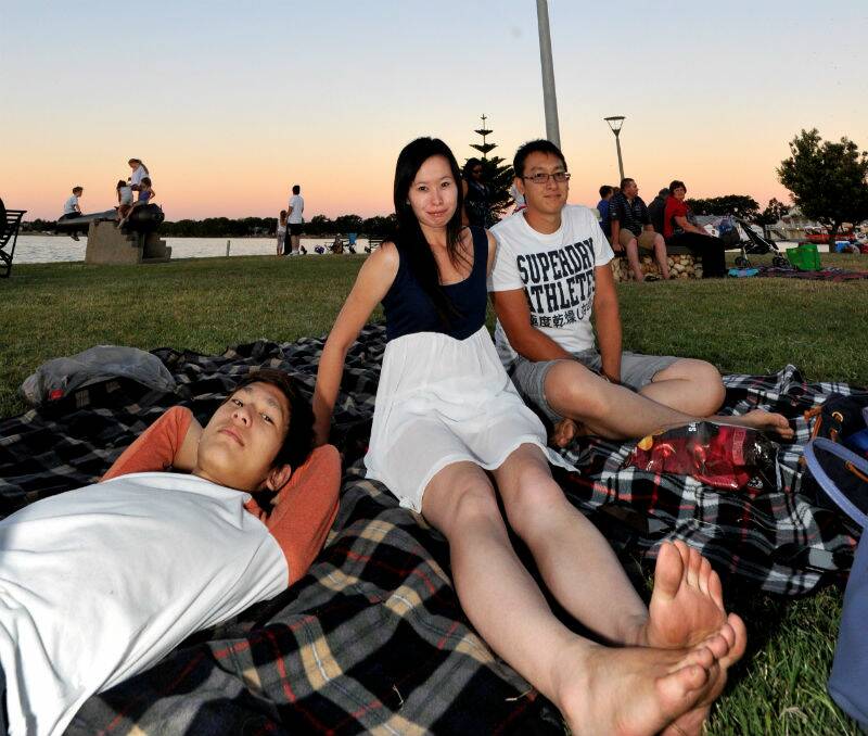 Anthony Dinh, Anne Truong and Khang Dinh at Lake Wendouree. PICTURE: JEREMY BANNISTER