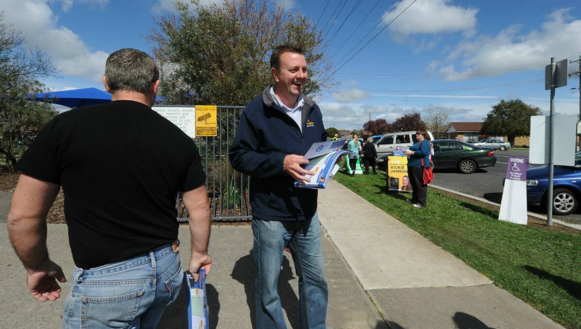 Ballarat Liberal candidate John Fitzgibbon speaks to voters at Forest Street Primary School. PICTURE: JUSTIN WHITELOCK