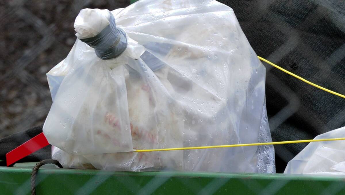 A bag of asbestos left unsecured at a Melbourne Road business. PICTURE: THE COURIER