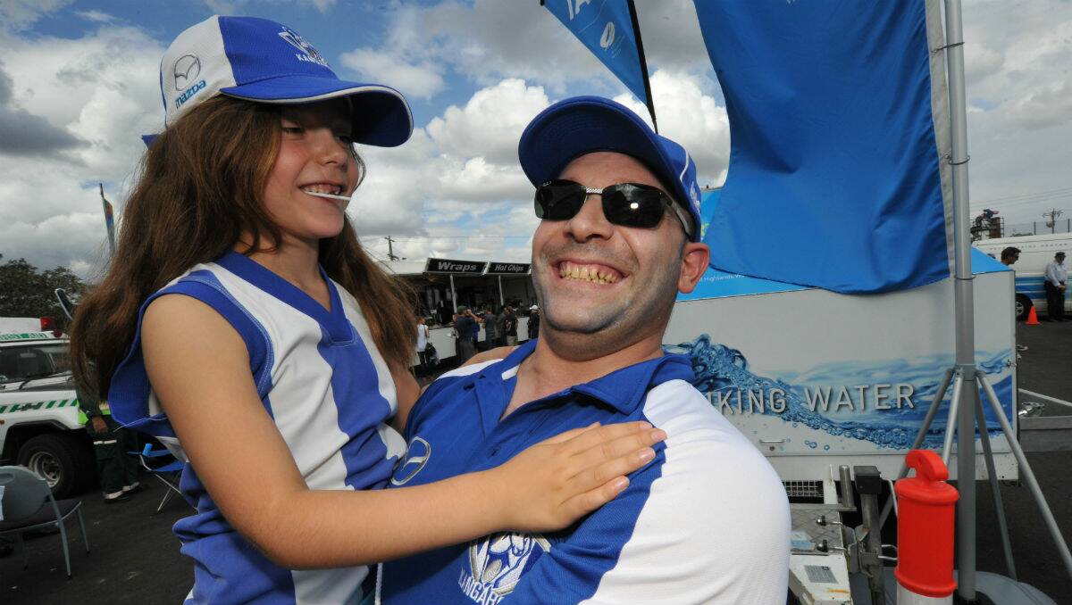 Piper and Peter Joyce at the North Melbourne clash against Carlton at Eureka Stadium. PICTURE: JEREMY BANNISTER