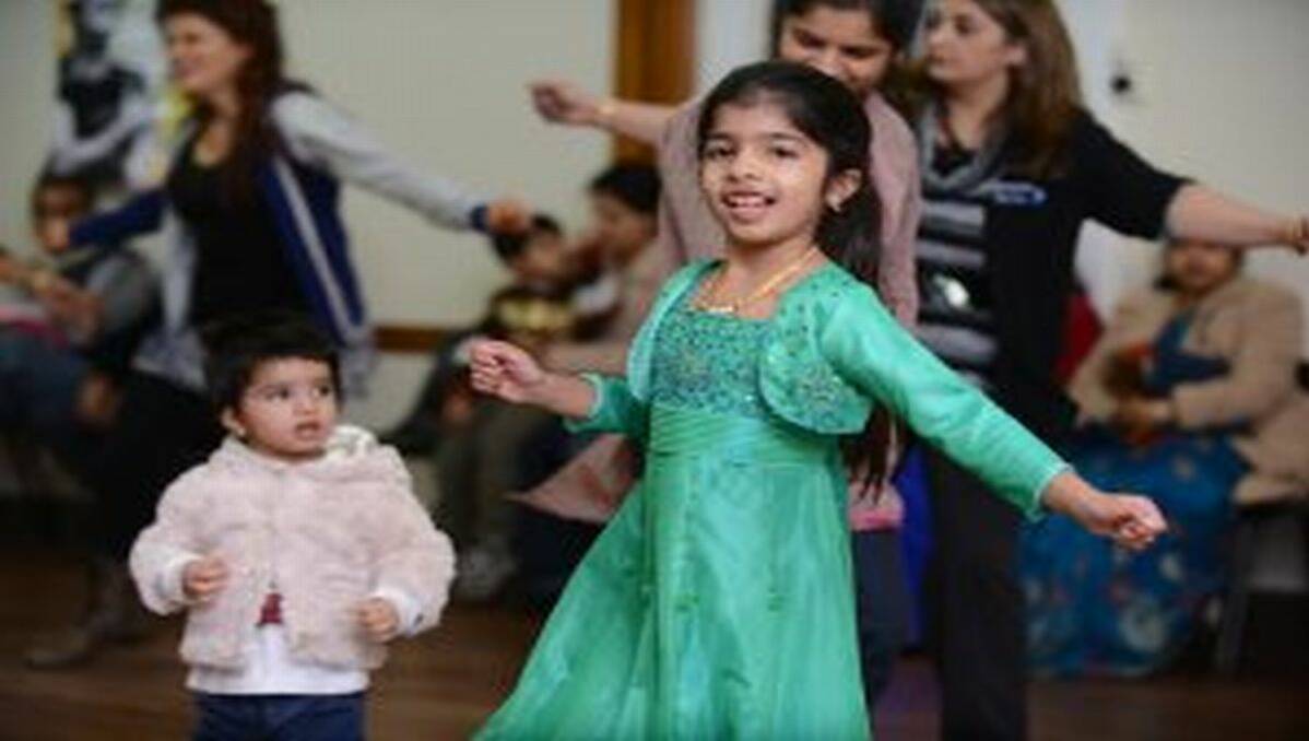 Tejal Kulkarni, 8, dances away to the music led by instructor Darshan Pawar during a Bollywood workshop at the Victorian Railway Instute Hall on Saturday. Picture: Adam Trafford