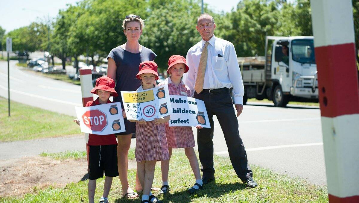 Jane Walsh and Ballarat East MP Geoff Howard with Harper, Daisy and Georgina Walsh at the school crossing. PICTURE: ANTHONY LEONG