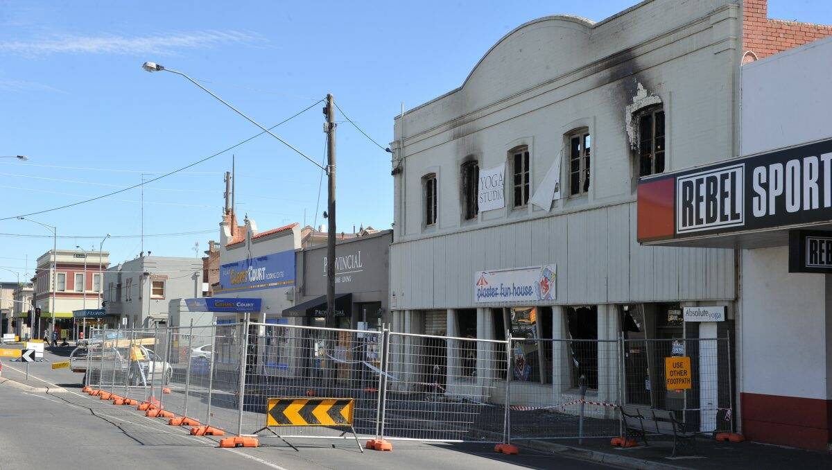 The north-bound lane of Grenville Street, outside the Plaster Fun House, is to remain closed for another fortnight. PICTURE: JEREMY BANNISTER