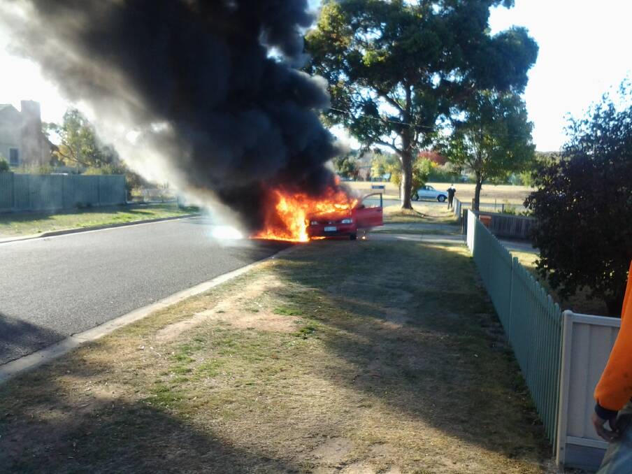 Car fire on Paling St. PHOTO: Darren Exon.