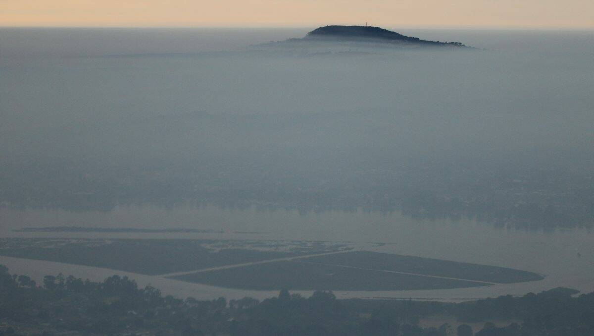 Smoke from Victorian fires covers Mount Buninyong and Mount Warrenheip. PICTURE: ED DUNENS