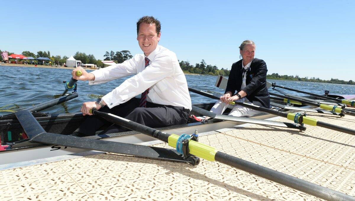City of Ballarat mayor Joshua Morris and FISA delegate Tone Pahle try out a boat during the official opening of the new pontoons at Lake Wendouree. PICTURE: KATE HEALY