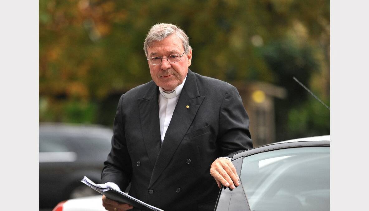 Cardinal George Pell arrives at Victoria's Parliament House to give evidence to the inquiry into institutionalised child sex abuse. PICTURE: JOE ARMAO