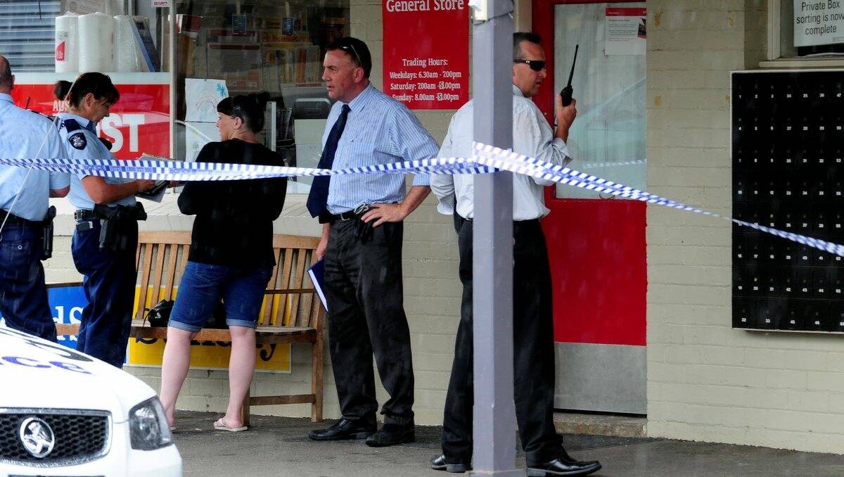 Police speak to witnesses following an armed robbery at Black Hill Post Office. PICTURE: JEREMY BANNISTER