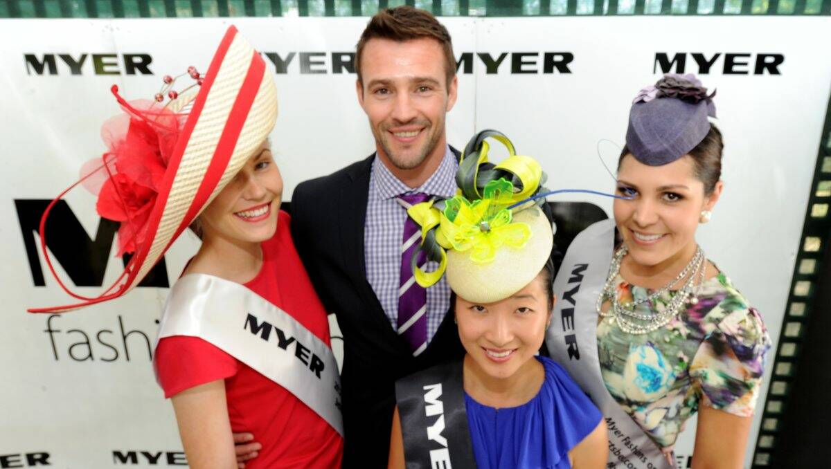 Ballarat Cup Fashions on the Fields winners Brooke Walter, Lisa Xu and Lauren Ellery with judge Kris Smith. PICTURE: JEREMY BANNISTER