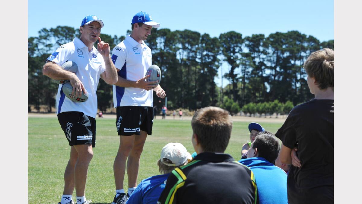 North Melbourne's Brent Harvey and Shaun Atley at the Specialist School. PICTURE: KATE HEALY