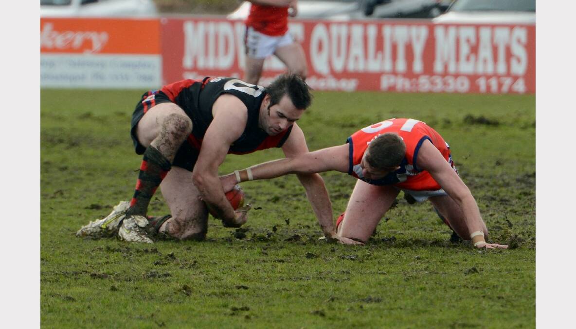 Buninyong's Phil Benn and Skipton's Zac Thorne. PICTURE: KATE HEALY. 